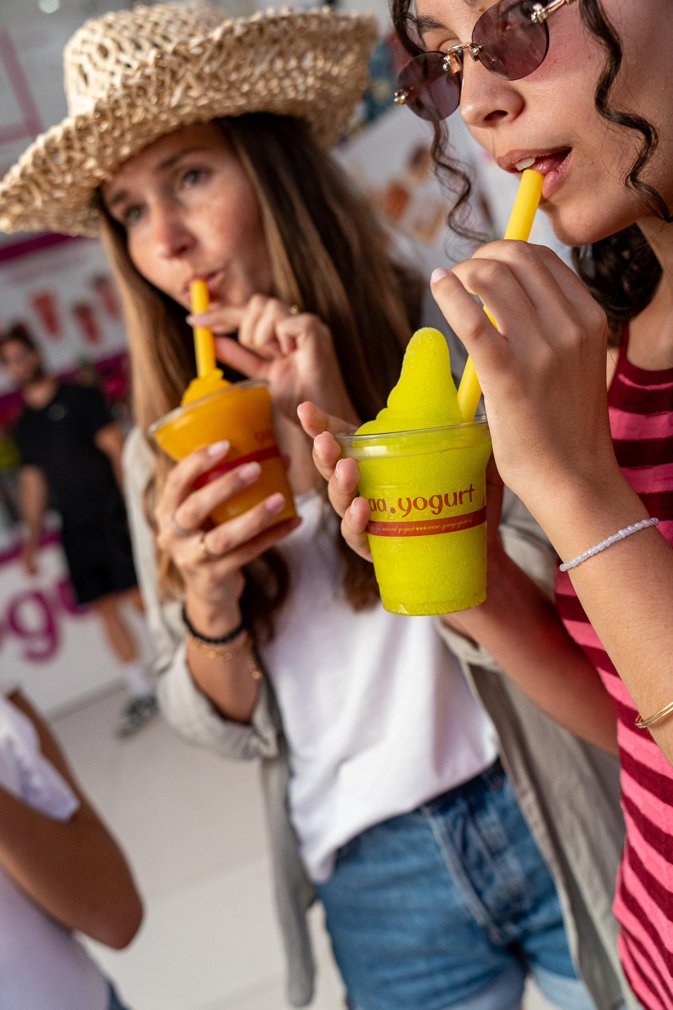 Colourful Yaa drinks in a customer’s hands